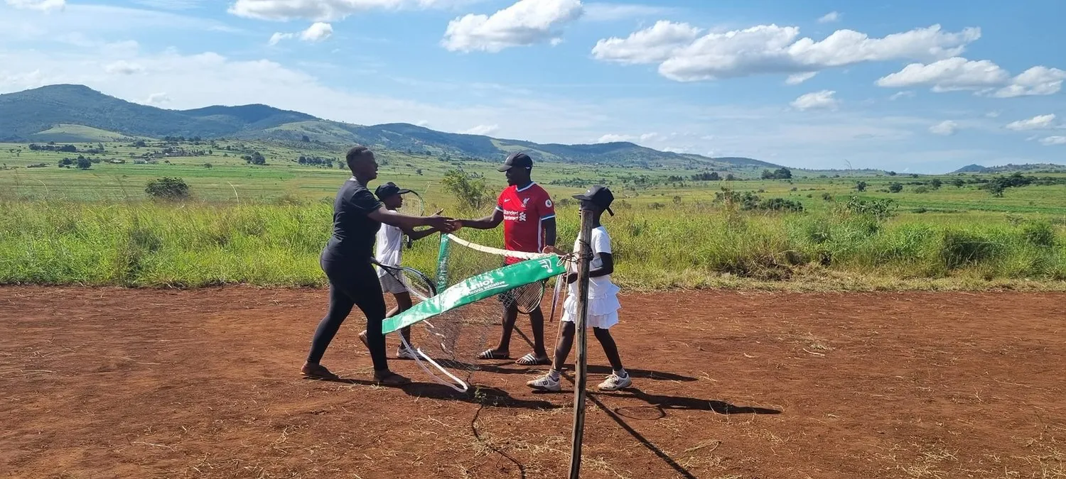 Children playing mini tennis outdoors